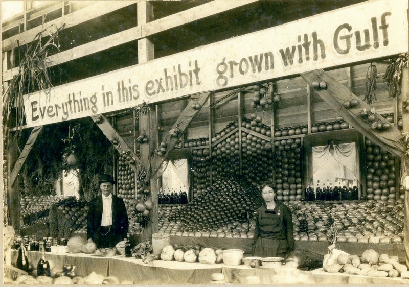 Ancil and Doris Walsingham at their exhibit at the Pinellas County Fair, Largo, Florida, circa 1900.