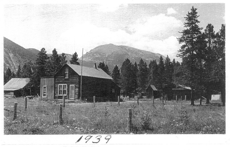 The two story Frank & Annie Ruth House in its original location in Frisco, Colorado. In this picture you can see the far corner of a single-story wood addition. These additions were common for kitchens or bedrooms as families grew or to make room for modern amenities. In the background sits Buffalo Mountain. 