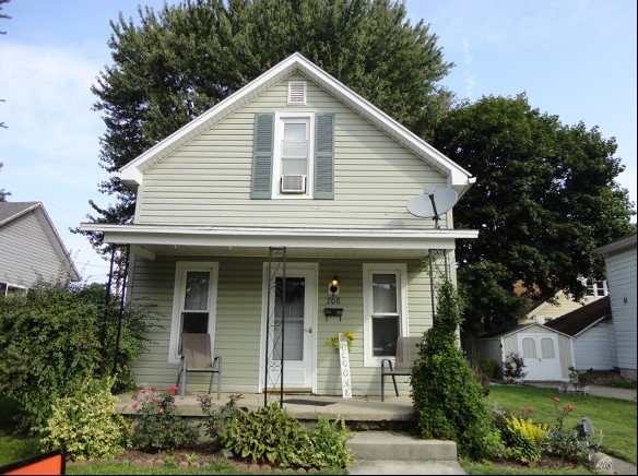 The front view of H.S. Lehr's first house located South Main Street just North of the Church of Christ Disciples.