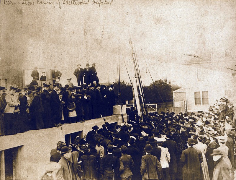 Laying the Cornerstone with a large crowd in attendance 