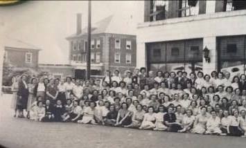 Workers outside the dress factory