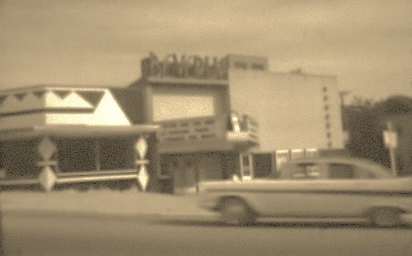 The Beverly, circa 1950s, with Evans Supermarket on its left