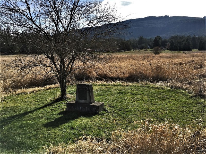 This historical marker indicates where Manis Mastodon Site is located. The site is one of the oldest archaeological sites in North America.
