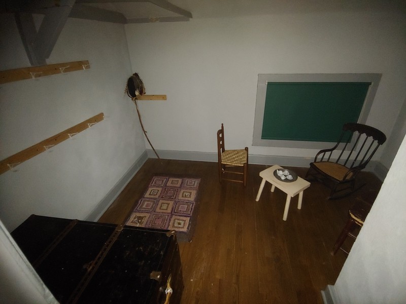 The upstairs side room was used as an extra bedroom by some families and a playroom by others.