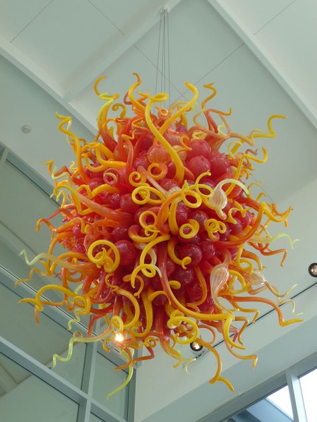 The Kalamazoo Ruby Light Chandelier by renowned glass sculptor Dale Chihuly welcomes guests to the Institute