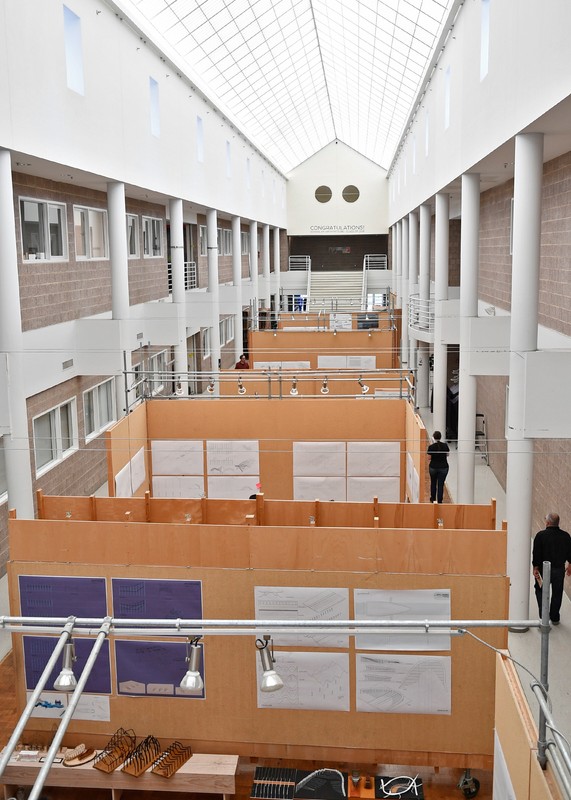 Storrs Hall interior with student projects on display in the center, 2018. The high skylight is notable, allowing for natural light to showcase the student projects.