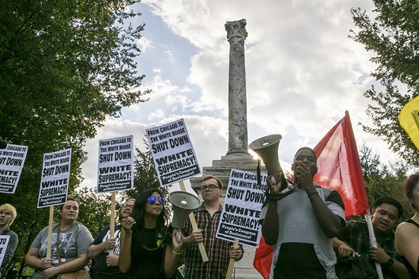 A group of protesters gathered in front of the Balbo Monument in August 2018. They held signs in protest of the White Supremacy.