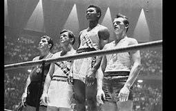 Cassius Clay winning the gold medal in the 1960s Olympics. The young 18yr old was six years into fighting and had already won a title. He maintained an undefeated record 19-0, this was the start of his career. He ended up signing with a sponsership and it turned him into a professional boxer. Muhammad, Cassius at the time, was against all odds and was an example for many young African Americans. Though he expereinced hard times and judgement at such a young age, it was only preparing him for the journey to come.