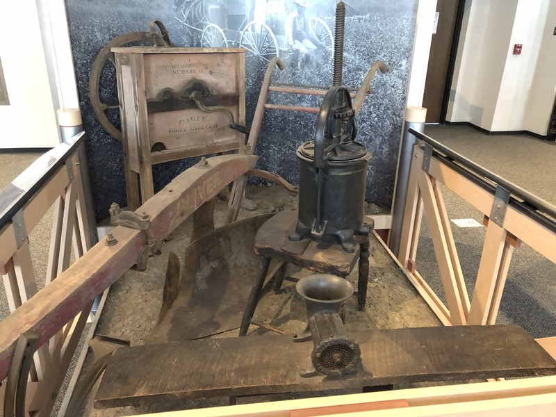 These tools, including the corn sheller, lard press, sausage grinder, and plow were used on farms in Licking County.