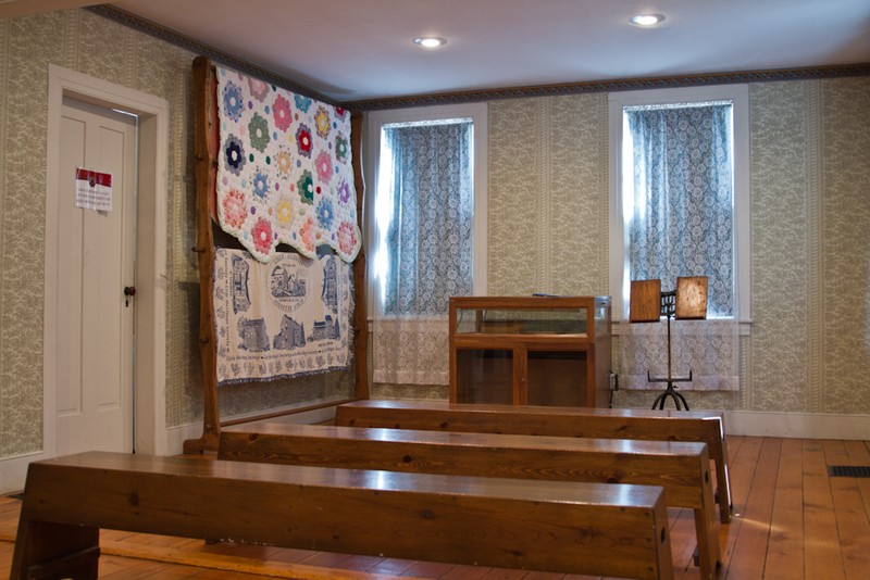 Double Parlor. The house's wallpaper patterns were recreated in the 1990s based on original pieces found during museum restoration.