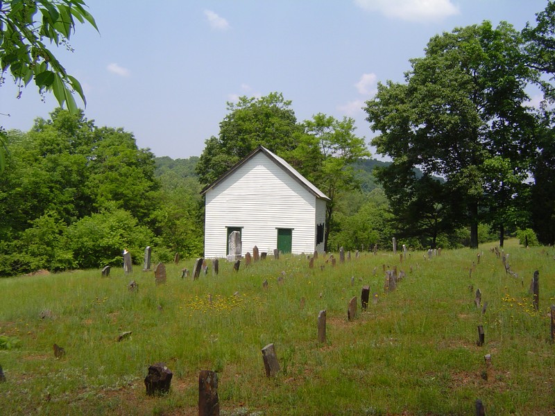 A view of the cemetery and two-door facade on the chapel