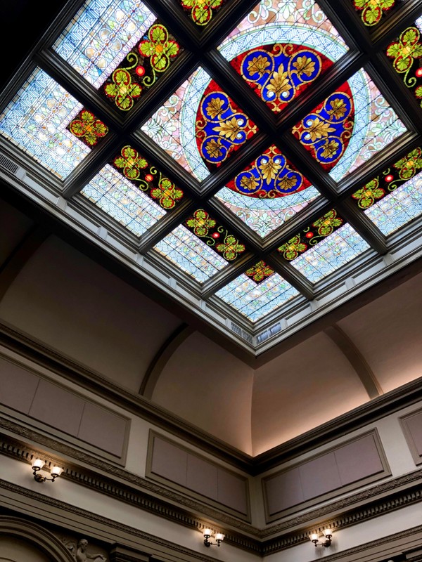 A stained glass skylight inside Burton Hall 