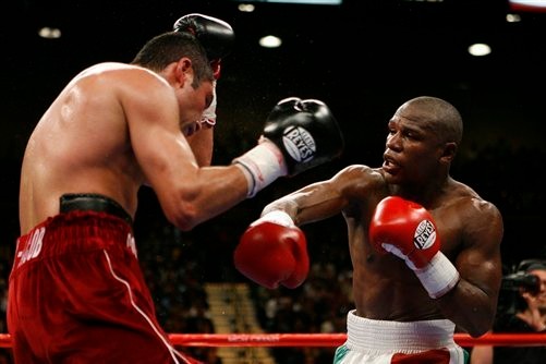 Mayweather landing a right hand