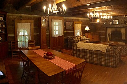 The inn contains four bedrooms, four and a half bathrooms, three porches, a full-sized kitchen, and a washer and dryer.