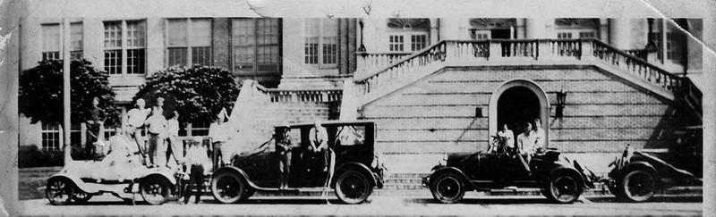 Cars lined up for a parade outside HHS steps, 1926