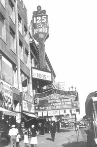 An early photo of the Apollo Theater.