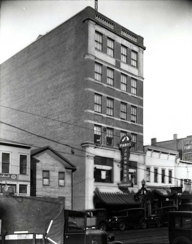 In the 1920s and 1930s, two other buildings occupied the space where the Alliance Area Chamber of Commerce is today at 210 E. Main Street, as seen in this 1929 photograph.