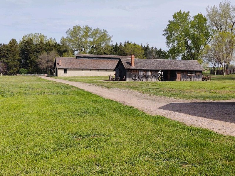 Blacksmith/Carpenter Shop with Stables in the background