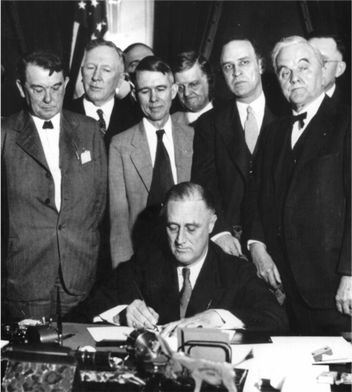 President Franklin D. Roosevelt signing the TVA Act (1933)