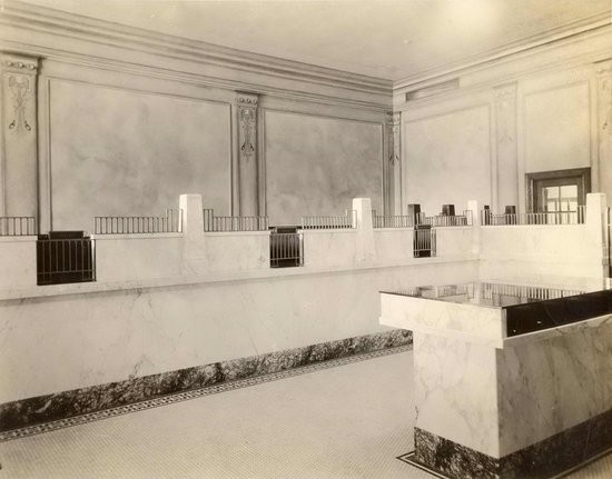 Interior of First National Bank, c. 1920