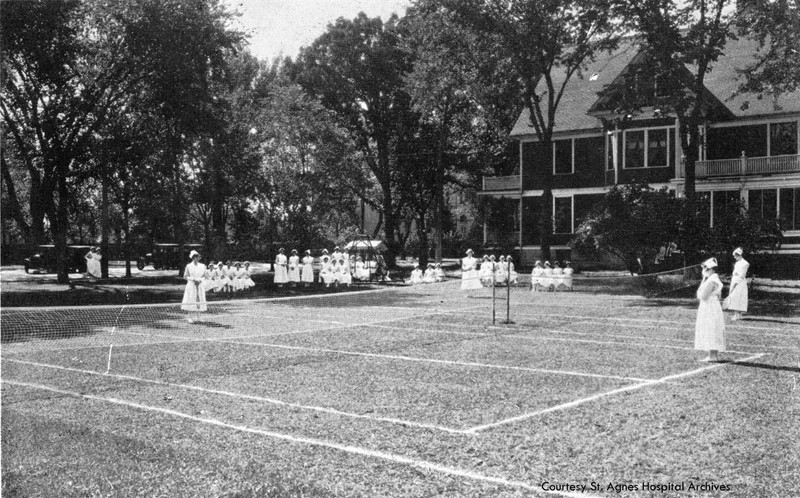 Student nurses play tennis during some recreation time, c. 1925.