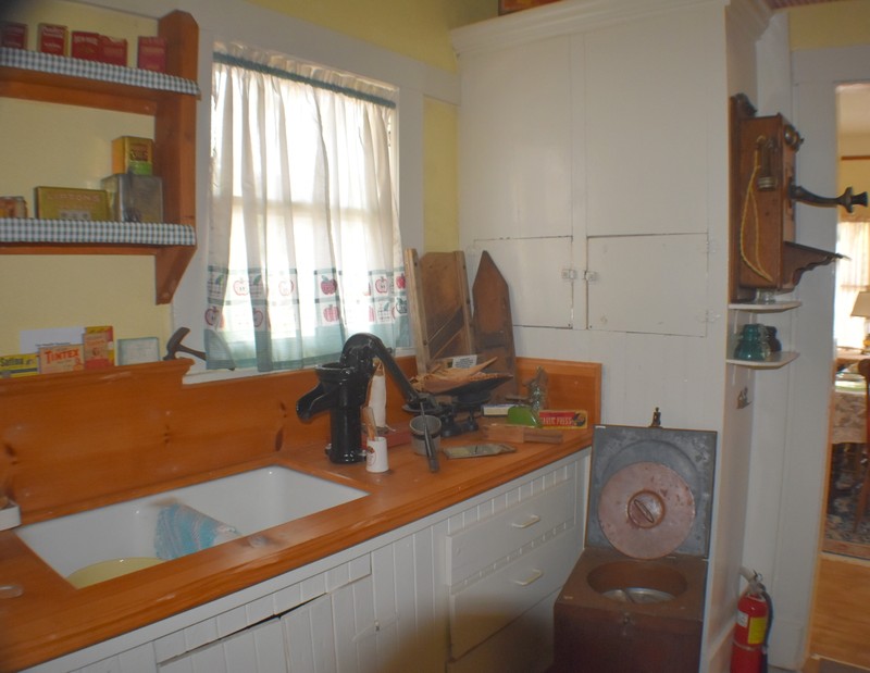 Kitchen with sink and pump