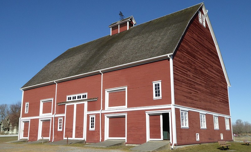 The Hovander Barn is quite large at 95-feet long and 65-feet long. It houses original farm equipment and tools.