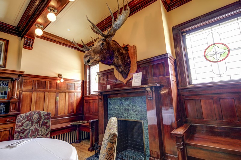 Image 3, Dining Room fireplace with taxidermy moose 