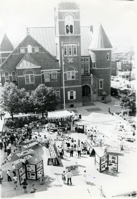 Photo of a "Creative Arts Exhibit" held in the courthouse plaza in 1966.