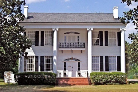 A circular staircase spiraling twenty-four feet is a notable feature of the house. 