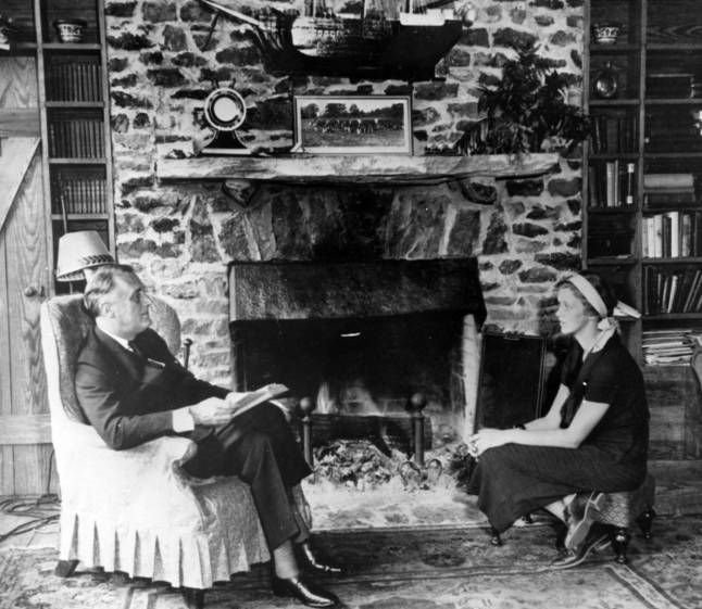 Governor Franklin D. Roosevelt and his daughter Anna in the living room of his newly-built home, the Little White House