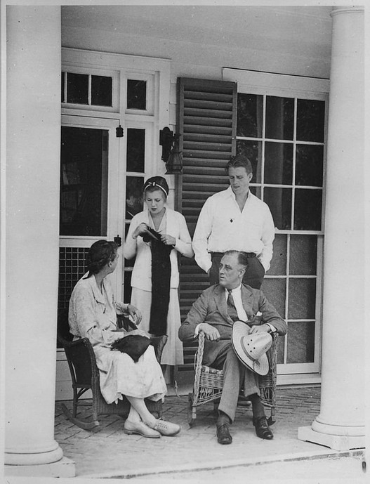 Eleanor Roosevelt, FDR, their son Elliott, and his wife Elizabeth "Betty" on the porch of the Little White House in 1932