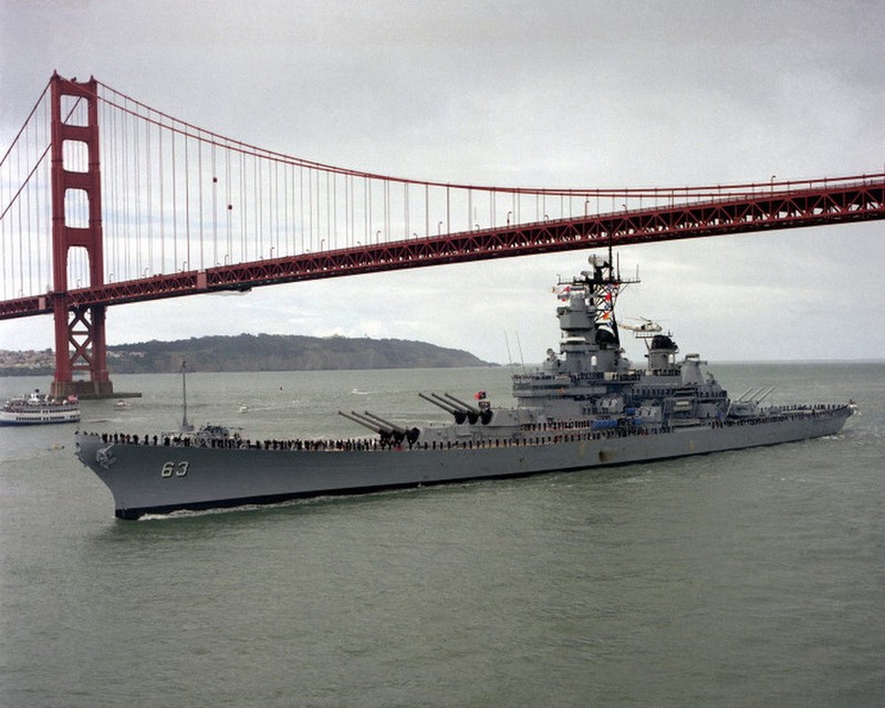 The USS Missouri sails under the Golden Gate Bridge.