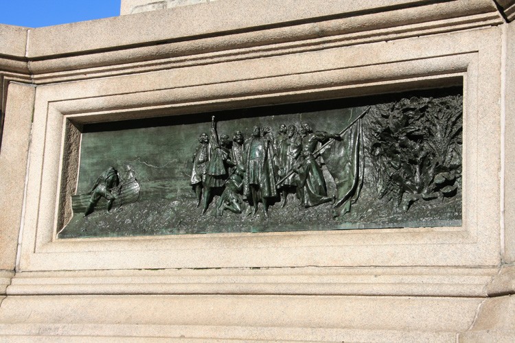 Christopher Columbus voyage scene represented via bas relief at the base of the memorial