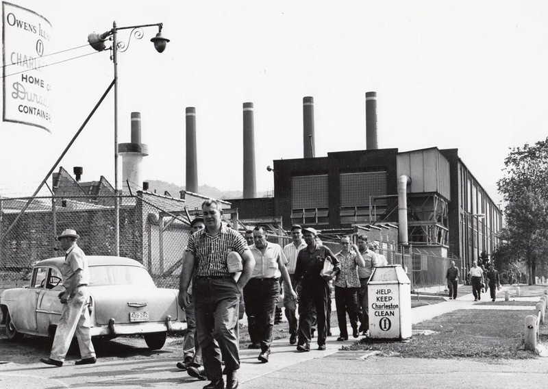 Workers leave the Owens-Illinois bottling plant, in Kanawha City, on May 18, 1962