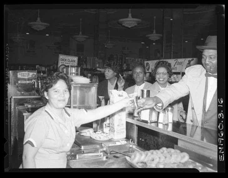 Group celebrating on first day of lunch counter integration, Woolworth's San Antonio