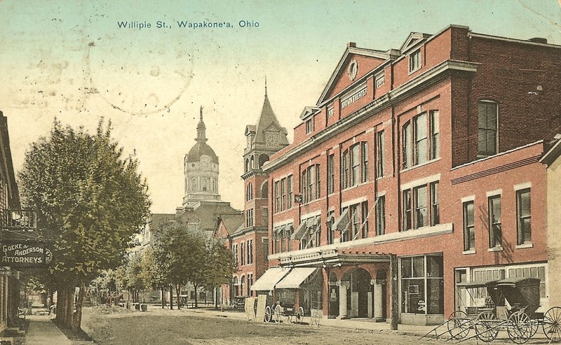 This streetscape image of Willipie (a picture postcard) also depicts the Theatre, Fire Station, and Courthouse.