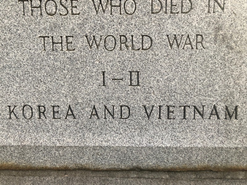 Close-up upon the last two lines of the original inscription and the newer inscription