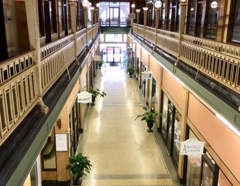 Narrow hallway extends from one block to another