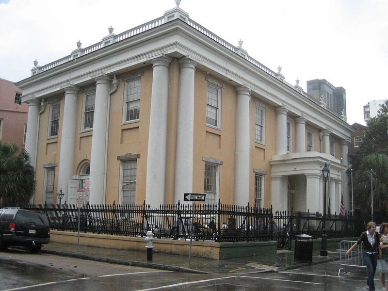 This historic bank building now serves as a police building and an information center for tourism.