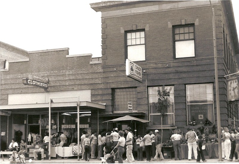 Building, street, trees, sidewalk, people