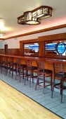 Ritz Building bar area, featuring stained glass windows