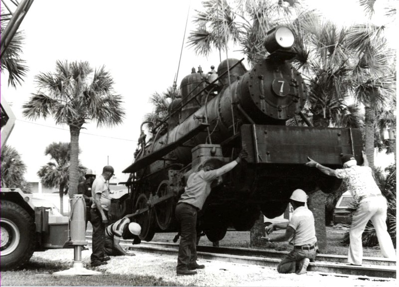 Locomotive #7 being lowered into position at Pablo Historical Park on April 14, 1982. The crews were from B.B.McCormick & Sons and M.C. Moody & Sons.