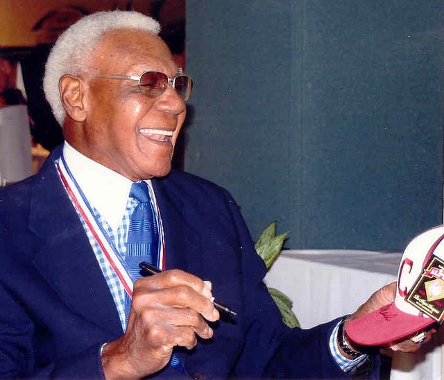 Buck O'Neil in 2005 signing autographs