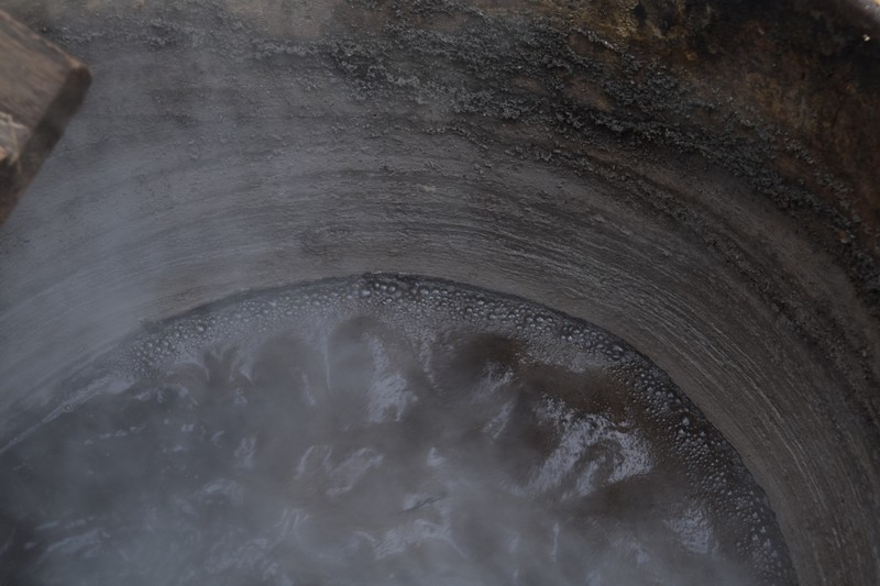 Close-up image of the heated potash kettle.