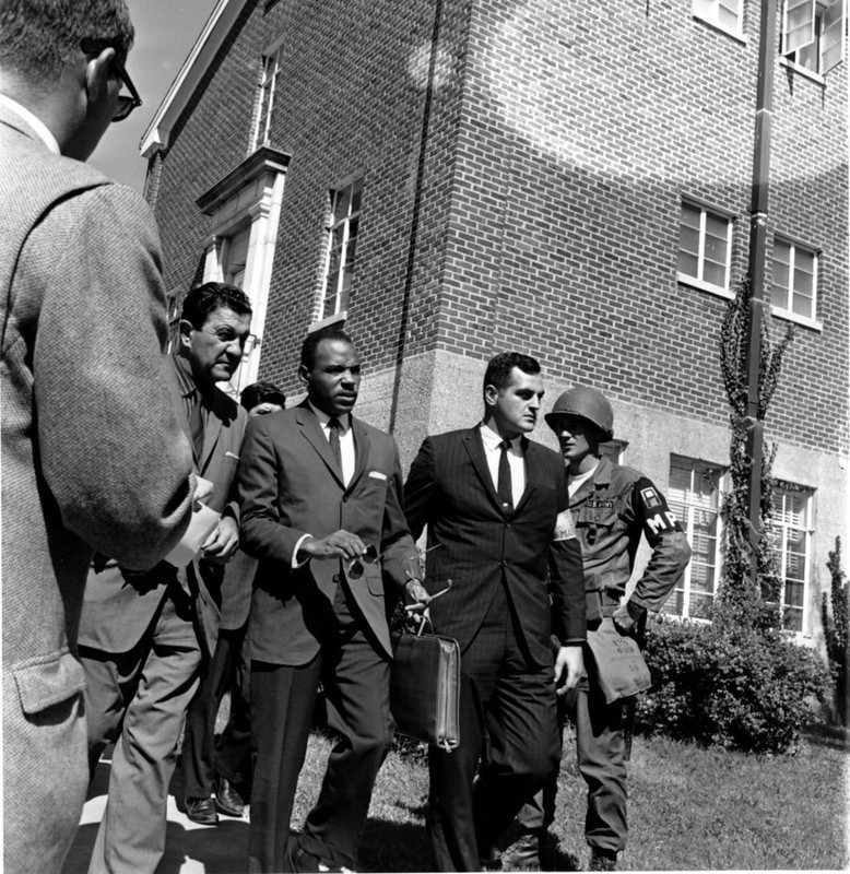 James Meredith flanked by federal Marshals in 1962