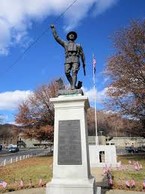 A picture of the monument on Middleburg Island in front of Logan High and Middle School 