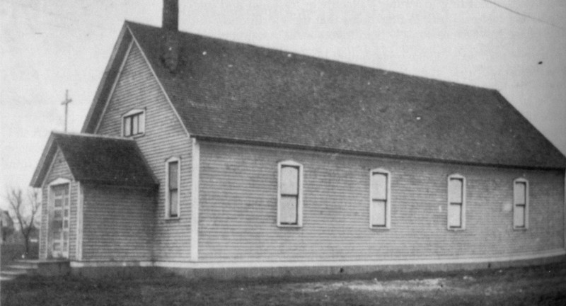 The original frame church constructed in 1903.