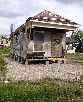 This house represents how dilapidated the neighborhood has become and what is left