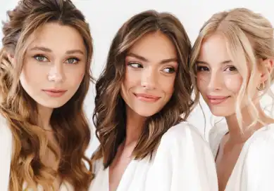 Group of women with beautifully styled hair, showcasing different sophisticated hairstyles